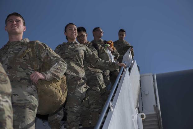 U.S. Air Force Airmen depart a KC-10 Extender Nov. 21, 2019, at Travis Air Force Base, California. (U.S. Air Force/Airman 1st Class Cameron Otte)