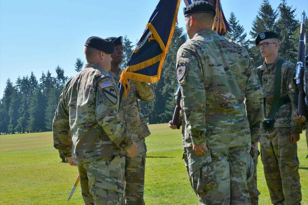 File –A change of command ceremony for the 1st Battalion, 17th Infantry Regiment at Watkins Field at Joint Base Lewis-McChord, Washington, July 26, 2018.. (U.S. ArmyStaff Sgt. Kenneth Pawlak)