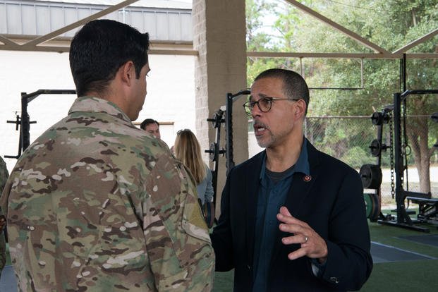 U.S. Rep. Anthony Brown speaks with a Special Tactics Airman at Hurlburt Field