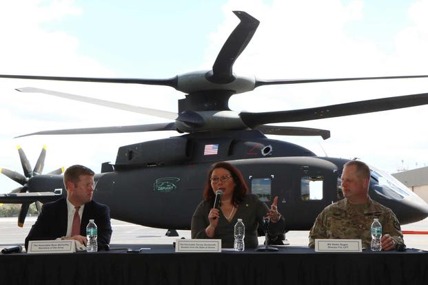 Army Secretary Ryan McCarthy, Army Brig. Gen. Walter Rugen and Sen. Tammy Duckworth at the demonstration of the SB-1.