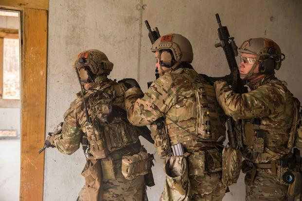 Green Berets prepare to enter a room during an exercise near Stuttgart.