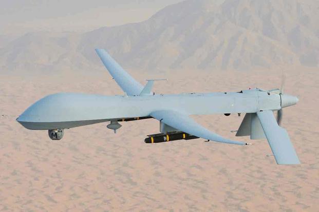 FILE -- An MQ-1 Predator, armed with AGM-114 Hellfire missiles