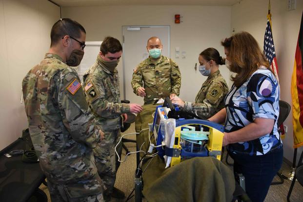 Ansbach Army Health Clinic personnel train in emergency medical techniques at Ansbach Army Health Clinic.