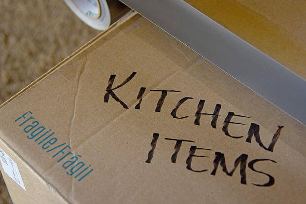 moving box of kitchen items