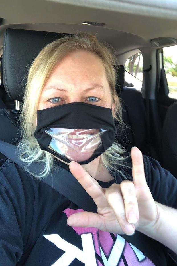 woman wearing a mask where you can see her mouth