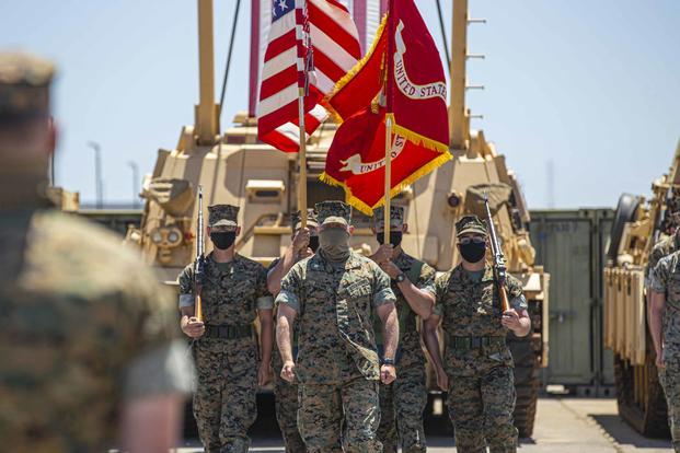 Alpha Company, 4th Tank Battalion, 4th Marine Division, Marine Forces Reserve, with the color guard during  deactivation ceremony.