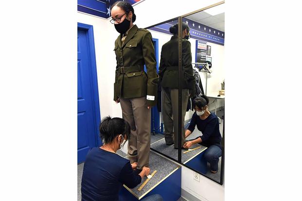 Army-Navy uniform tells story of Army Division, Article