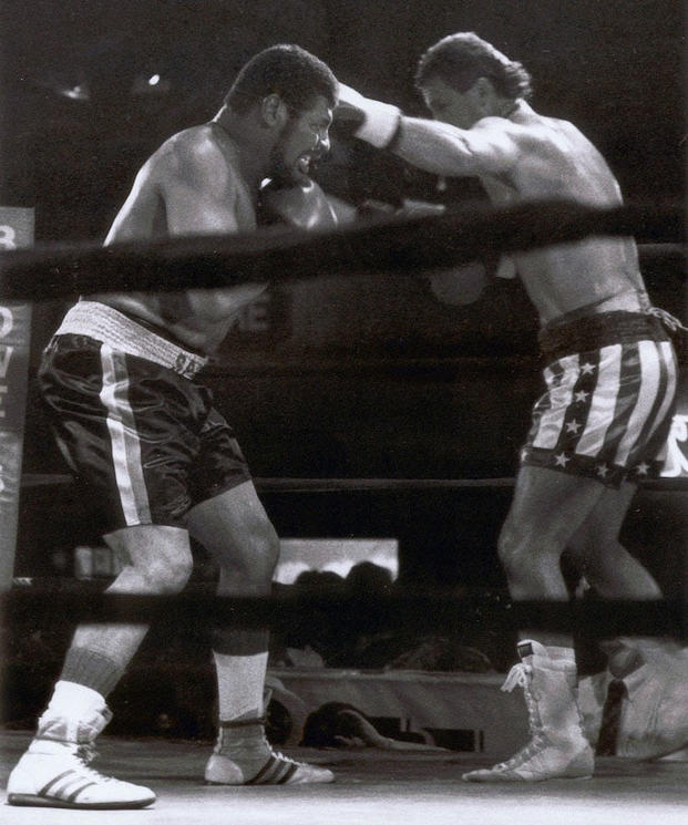 Leon Spinks, left, boxes in a match with Ray Kipping.