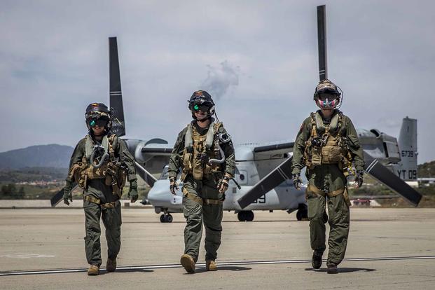Two MV-22B Osprey pilots and a tiltrotor crew chief.