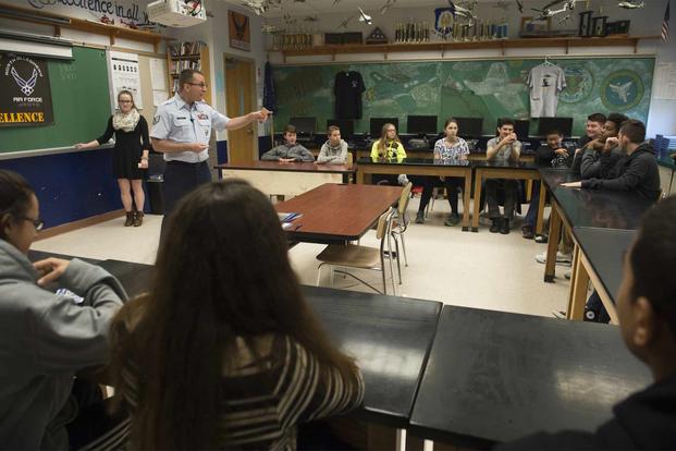 Staff Sgt. Geoffrey Moshier, an Air Force recruiter, speaks with students.