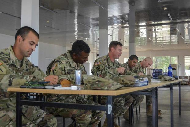 A U.S. Army soldier is evaluated for a promotion board.
