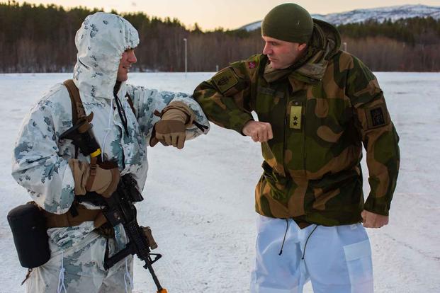Maj. Alex Puraty greets the chief of the Norwegian Army.