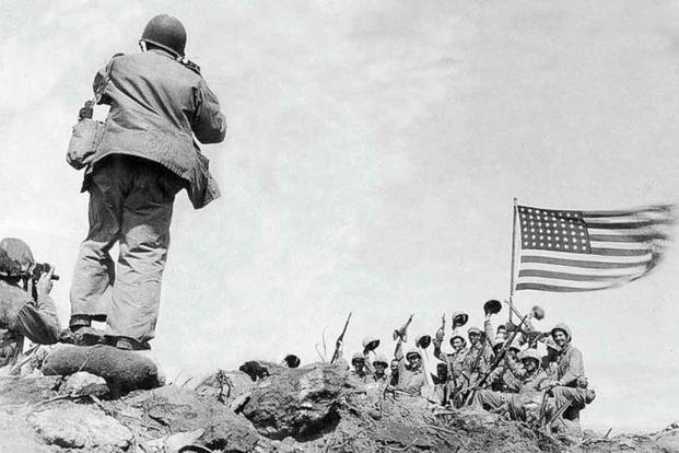 Was this iconic World War II photo staged? Here's the heroic true story.