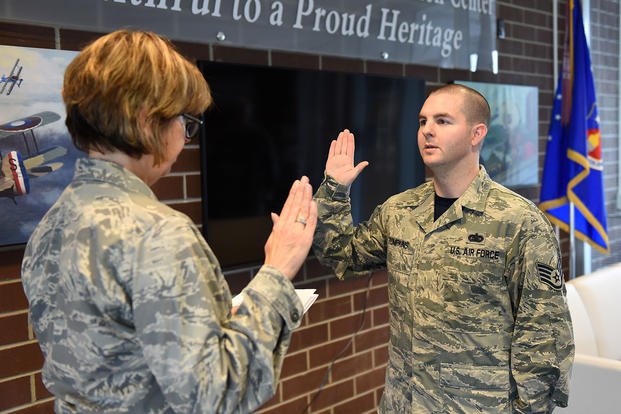 Staff sergeant reenlists in Air National Guard