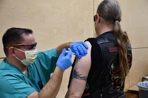 A Montana veteran receives his first dose of the Moderna vaccine.