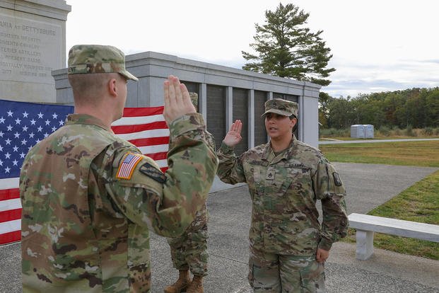 Staff sergeant reenlists in Army