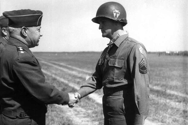 TSgt. Charles H. Coolidge receives the Medal of Honor.