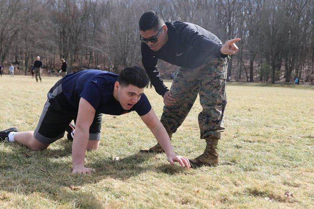Marine Corps pool program member works out.