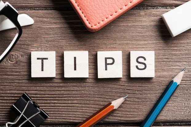 Wooden tiles spelling out "TIPS"