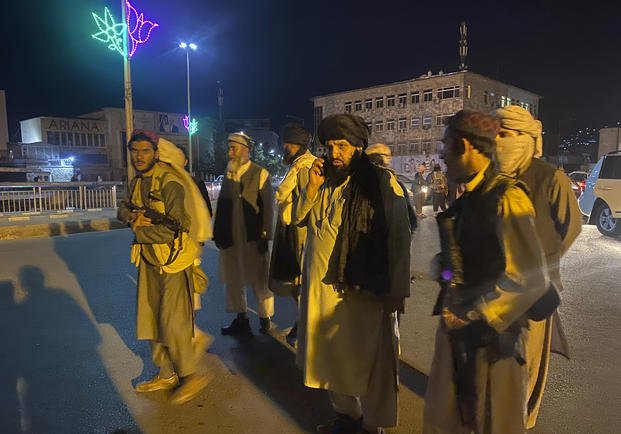 Taliban fighters take control of Afghan presidential palace after the Afghan President Ashraf Ghani fled the country