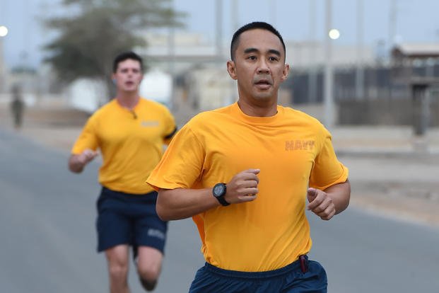 Sailors practice for physical readiness test.