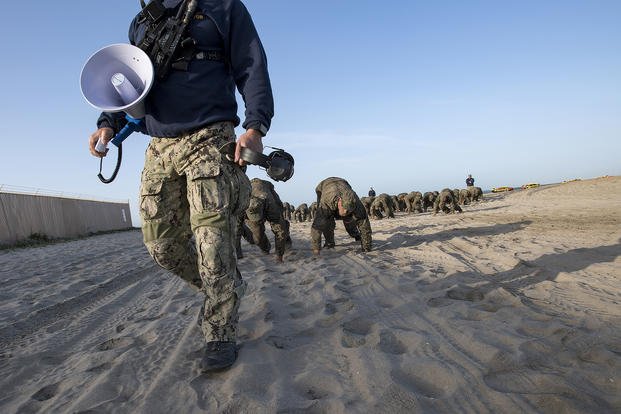 SEAL candidates participate in Basic Underwater Demolition/SEAL training.