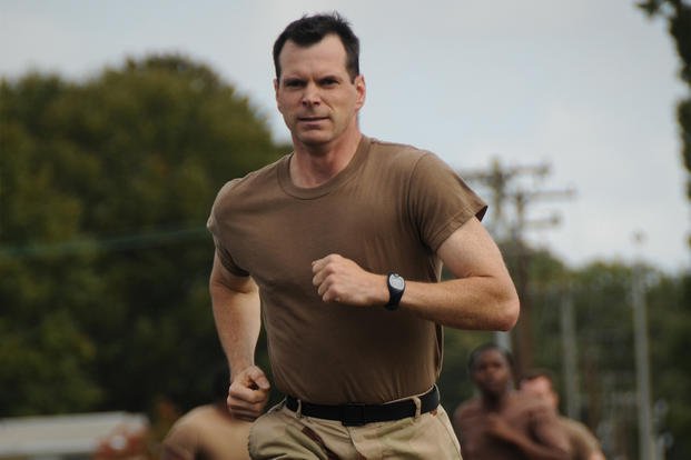 Marine runs during physical fitness test.