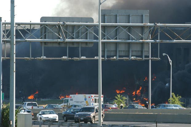The Pentagon seen from across VA-27 S Washington Blvd a few minutes after American Airlines Flight 77 hit the building, 11 September 2001. 