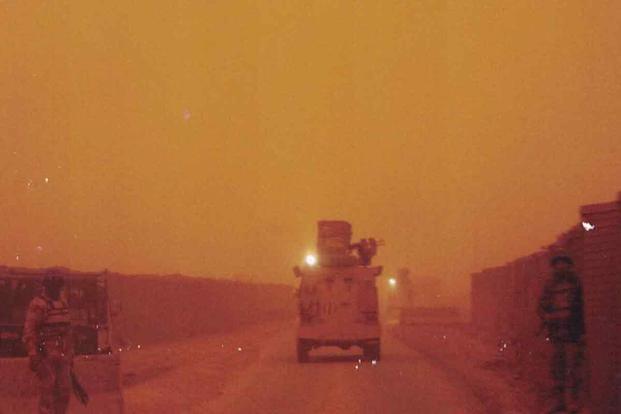 John Thampi’s convoy drives through a sandstorm in Iraq in 2007