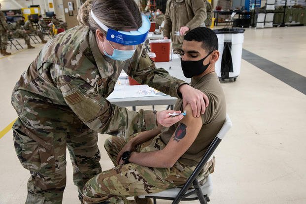National Guardsman receives COVID-19 vaccine.