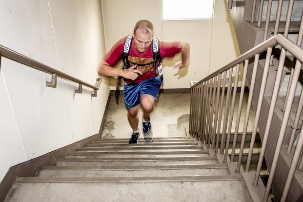 An airman runs stairs during the 9/11 Tower Run.