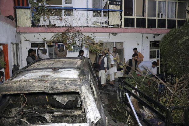 Afghans inspect damage of Ahmadi family house after U.S. drone strike