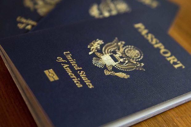 A United States Passport sits on a table