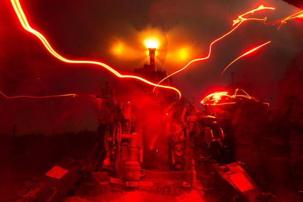 Marines fire an M777 howitzer at Fort Bragg, N.C., Oct. 19, 2021, during Rolling Thunder 1-22, a live-fire artillery exercise led by the 10th Marine Regiment. 