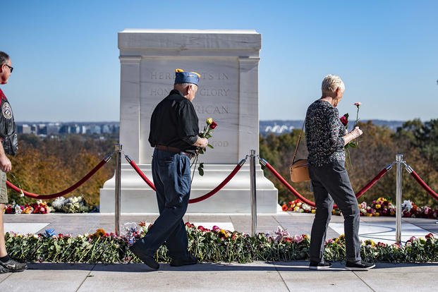 Visitors participate in the Tomb of the Unknown Soldier Centennial Commemoration Flower Ceremony.