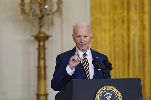 President Joe Biden speaks during a news conference in the East Room of the White House