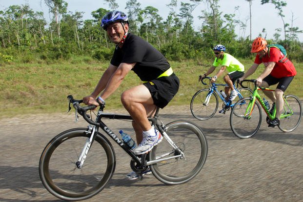 An Army major general participates in the CEO Caucus Challenge Cancer Awareness Ride in Belize.