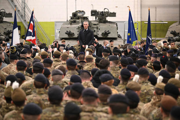 Secretary General of NATO Jens Stoltenberg meets NATO troops.