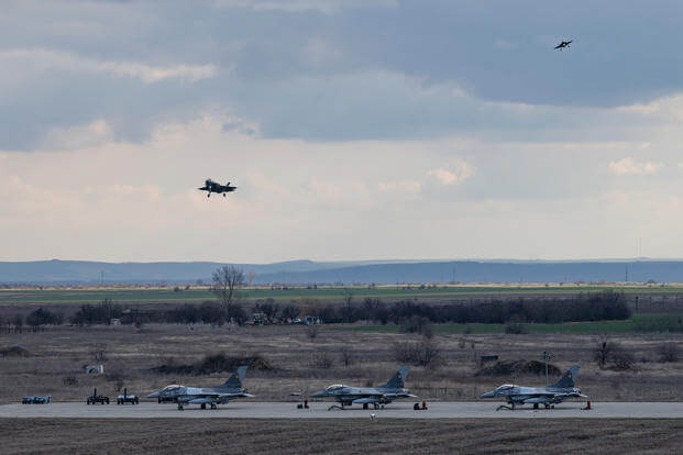 Two U.S. Air Force F-35 Lightning II aircraft prepare to land at the 86th Air Base, Romania
