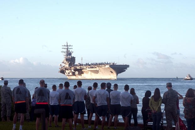 The Nimitz-class aircraft carrier USS Ronald Reagan (CVN 76) arrives at Joint Base Pearl Harbor-Hickam.