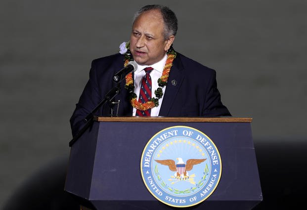 Navy Secretary Carlos Del Toro speaks at the 80th Pearl Harbor Anniversary ceremony