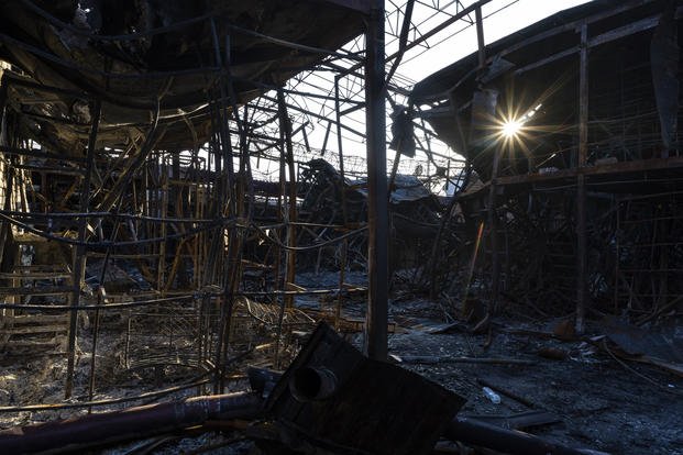charred structures of one of the shelled sections of the Barabashovo market in Kharkiv