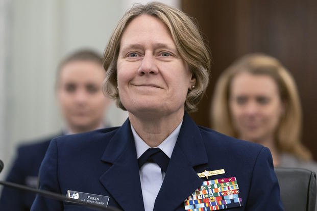 Coast Guard Admiral Linda Fagan smiles as she is introduced during her nomination hearing to be commandant of the Coast Guard.