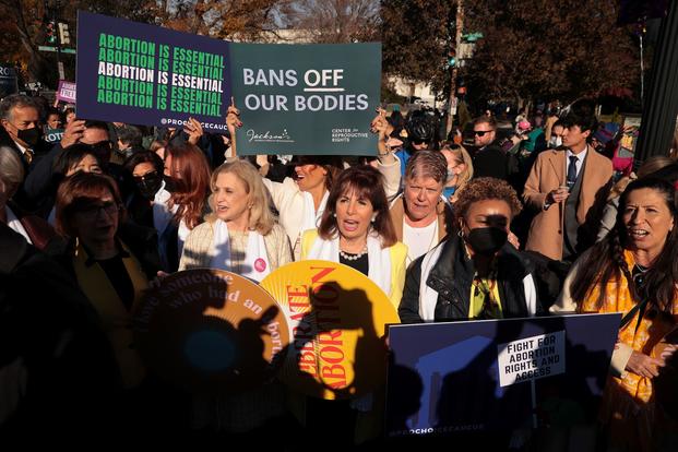 Members of Congress, including Rep. Carolyn Maloney (D-New York), Rep. Jackie Speier (D-California), Rep. Barbara Lee (D-California) and others join a pro-choice rally in front of the U.S. Supreme Court as the justices hear hear arguments in Dobbs v. Jackson Women's Health, a case about a Mississippi law that bans most abortions after 15 weeks, on Dec. 1, 2021 in Washington, D.C. (Chip Somodevilla/Tribune News Service) A pro-choice rally in Washington, D.C.