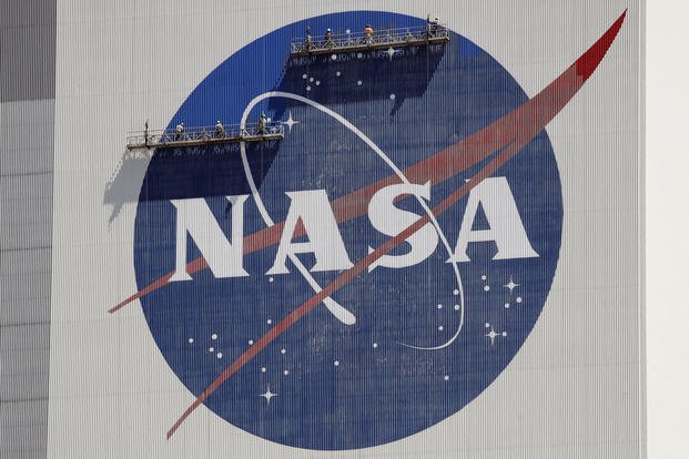 NASA logo near the top of the Vehicle Assembly Building at the Kennedy Space Center