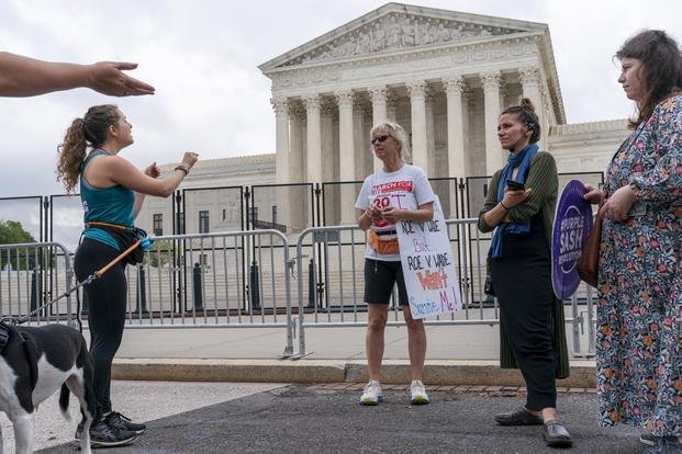 Discussion about abortion rights in front of Supreme Court.