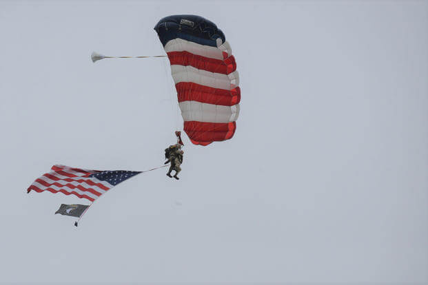 An Army veteran from the 101st Airborne Division, 501st Parachute Infantry Regiment, recreates his D-Day jump.