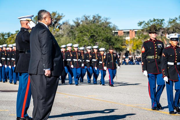 Secretary of the Navy Carlos Del Toro conducts a pass in review with Col. Bradley W. Ward, commanding officer, Recruit Training Regiment, during the graduation ceremony on MCRD Parris Island.