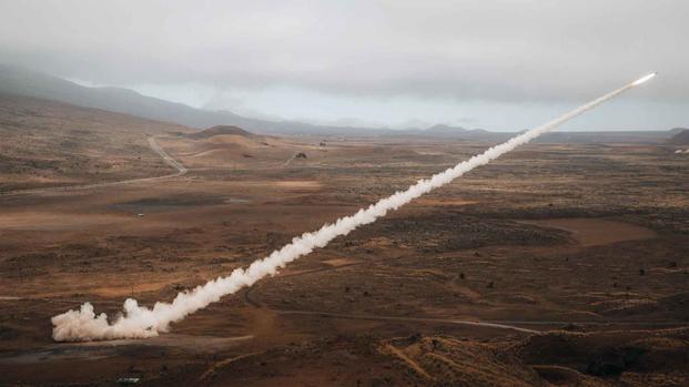 U.S. Marines launch High Mobility Artillery Rocket System (HIMARS).