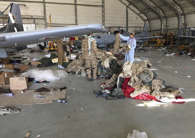 Taliban collect military clothes after the Taliban's takeover.